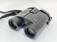A pair of Leica (8X32) Trinovid Binoculars together with manual and original branded leather bag