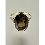 A 9ct gold dress ring set oval faceted cairngorm mounted in claw setting, approximately 3.5ct R 3.