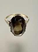 A 9ct gold dress ring set oval faceted cairngorm mounted in claw setting, approximately 3.5ct R 3.