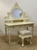 A French style white finish dressing table, with swing mirror and four drawers raised on turned