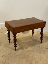 A Victorian mahogany commode, the lift off lid opening to a turned wood and ceramic liner, raised on