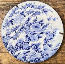 A monumental Meiji period Japanese Arita yaki sometsuke porcelain blue and white dish painted with
