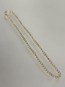 A 9ct gold curb link chain necklace with lobster clasp fastening L x 22cm, no signs of damage or