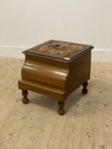 A Victorian mahogany commode, the hinged top inset with fabric panel and opening to a white