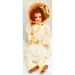 A good large size Heubach Koppelsdorf German bisque head doll with flirty eyes, open mouth and