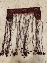 A hand knotted tribal / nomadic wall hanging. H144cm, W110cm.