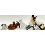 A group of ceramic animal figures comprising a Royal Doulton cat (h- 12cm, w- 19cm), three Royal