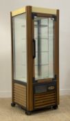 A Scaiola refrigerated patisserie / cake display cabinet with five revolving tiers, moving on