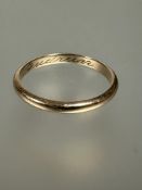 A 14ct gold wedding band with engraved inscription, Gudrum S 2.62g