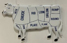 A vintage enamel beef cow cut sign. L80cm, H50cm.