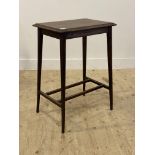 An early 20th century oak occasional table, the top with moulded edge raised on square tapered and