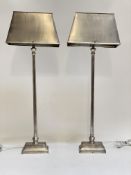 A pair of contemporary steel table lamps. H78cm.
