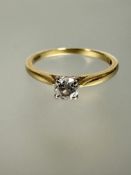 An 18ct gold solitaire brilliant cut diamond ring set in four claw setting, diamond approximately