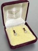 A pair of 14ct gold garnet and cultured pearl drop earrings L x  1.6cm 2.73g
