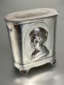 A Edwardian Birmingham silver oval tea caddy with chased portrait panel to fron and chain link