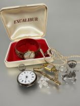 A white metal Edwardian open face fob watch with white enamel dial and roman numerals not working, a