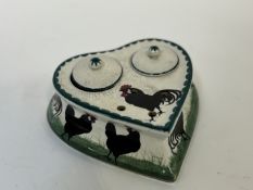 A Wemyss pottery heart shaped inkwell/desk stand with black cockerels and chickens with green