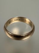 A 14ct gold wedding band W, sign of reduction W 7.03g