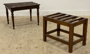 A late Victorian mahogany luggage stand, having a slatted top raised on turned and tapered