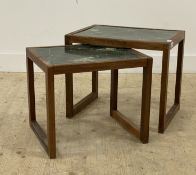 A mid century teak nest of two tables, each with simulated serpentine marble tops. H47cm, W55cm,