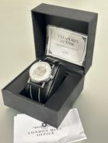 A London Mint Samler Huset silver sovereign mounted gents unused wristwatch with arabic numerals and