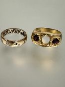 A 9ct gold ring set two red end faceted cut stones center stone missing Q and a 9ct gold ring set