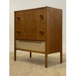 McIntosh of Kirkcaldy, A mid century teak chest, fitted with five drawers, raised on turned