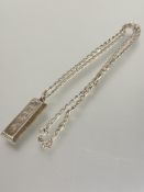 A Queen Elizabeth II silver ingot pendant on silver curb link chain, ingot L x 4cm total length 35cm