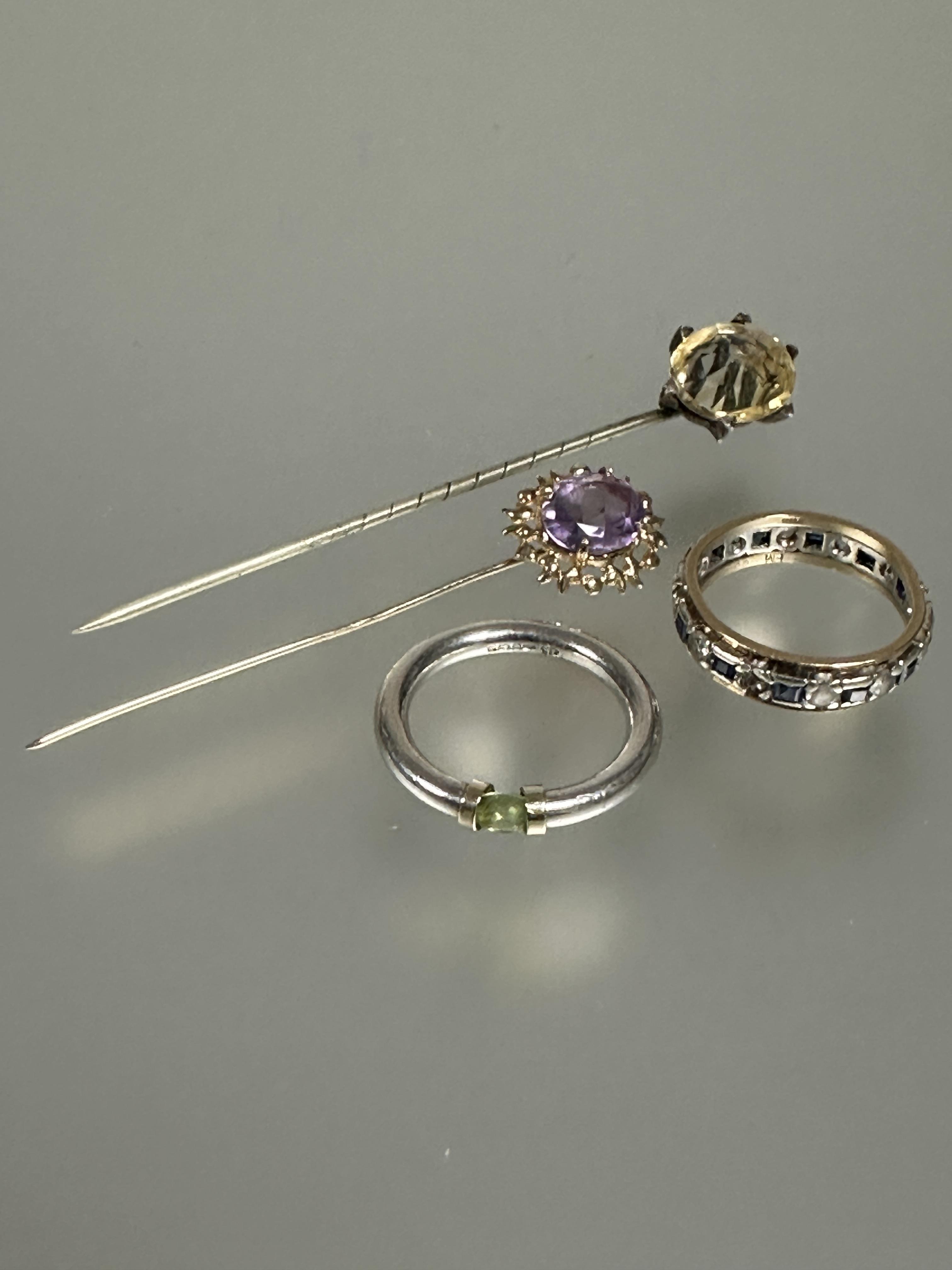 A 9ct gold stick pin set oval faceted amethyst in claw setting, approximately 2ct, a reverse set