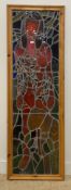 Lillia Handson, 'Eve' A large lead glazed stained glass panel depicting a nude lady and big cat,
