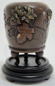 A Japanese Meiji period mixed metal miniature bronze tripod urn/vase (possibly koro) decorated