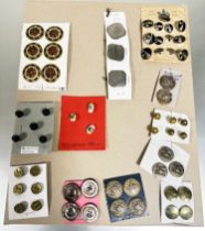 A board containing a collection of vintage buttons to include, of six enamel E.M of Paris circa 1900