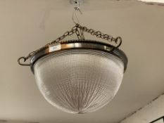 A vintage Holophane hanging pendant light fitting, domed and moulded glass shade shade with chains.