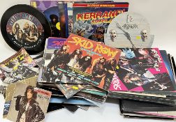 A large quantity of vintage records/vinyl tins, mainly 80's metal/rock and roll, comprising ACDC,