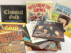 A large quantity of vintage records including Queen, Johnny Cash, musicals (Jesus Christ