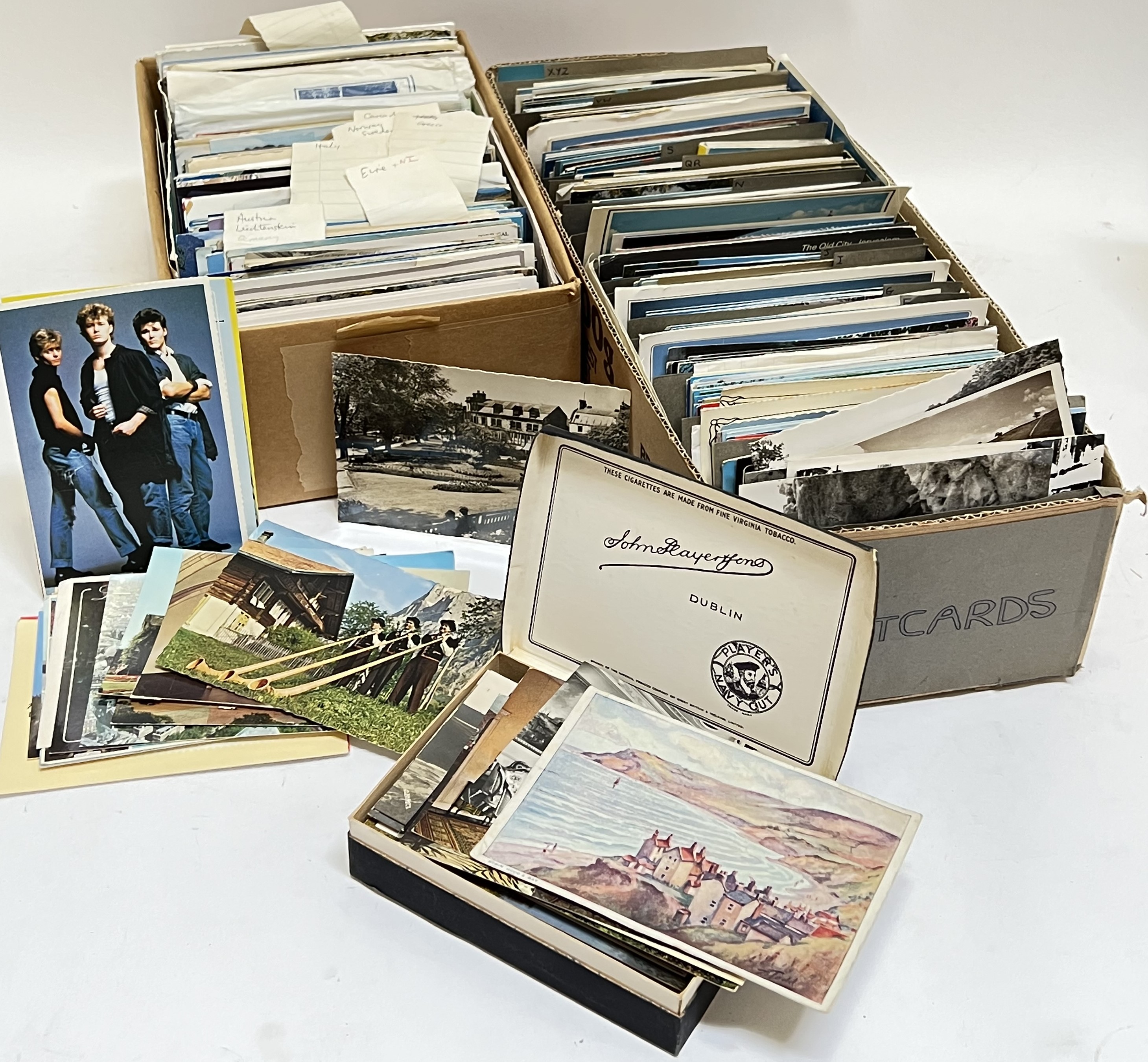 A large quantity of vintage postcards and photographs, mainly European geographical themes,