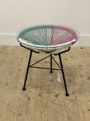 A Vintage lamp table, the circular glass top raised on three splayed supports. H46cm.