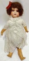Armand Marseille, a German bisque head doll with flirty eyes, open mouth, and real hair (h- 40cm)