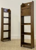 A pair of early 20th century Arts and Crafts bedroom bookcases, each with pierce carved raised back,