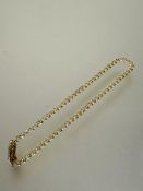 A 14ct gold flat link chain bracelet with clip fastening, with locking side bar, no signs of