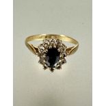 A 9ct gold sapphire and clear stone cluster ring O 1.51g