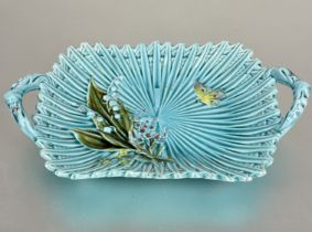 A 19thc Minton style two handled majolica dish of fluted basket style design turquoise glaze with