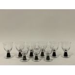 A set of six and three art glass drinking glasses with mottled stems. H15cm / H13cm.