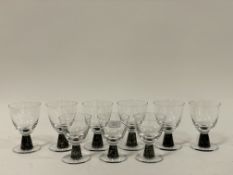 A set of six and three art glass drinking glasses with mottled stems. H15cm / H13cm.