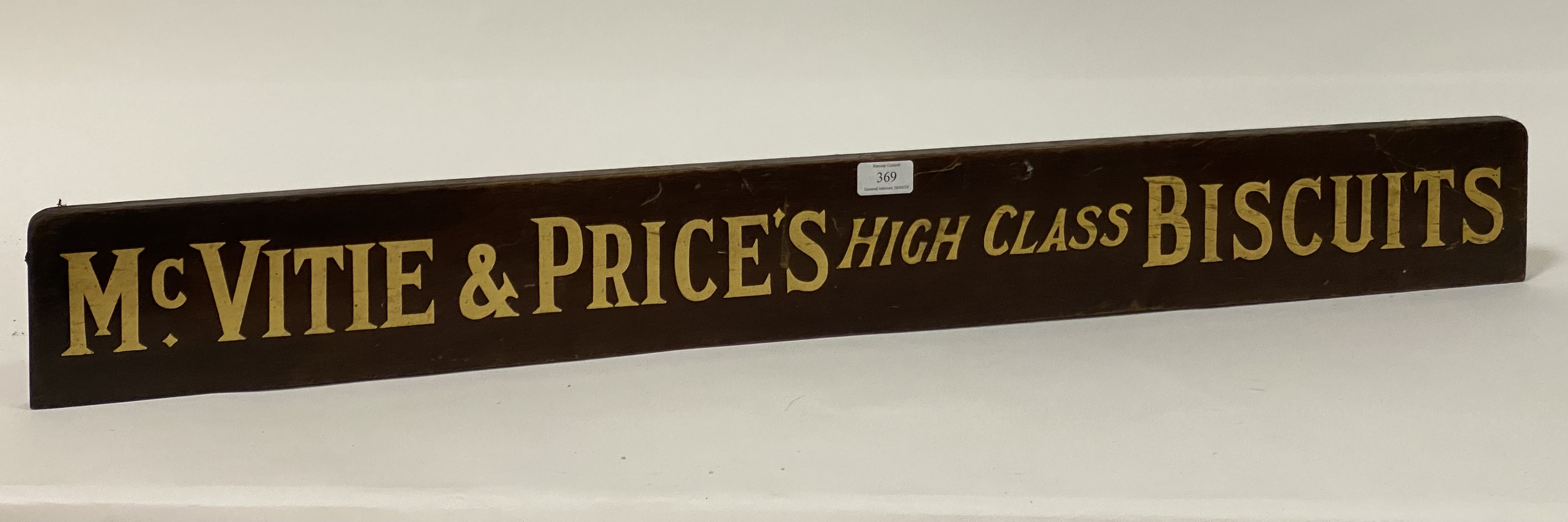 A McVities & Prices High Class Biscuits advertising sign, early 20th century, the mahogany board