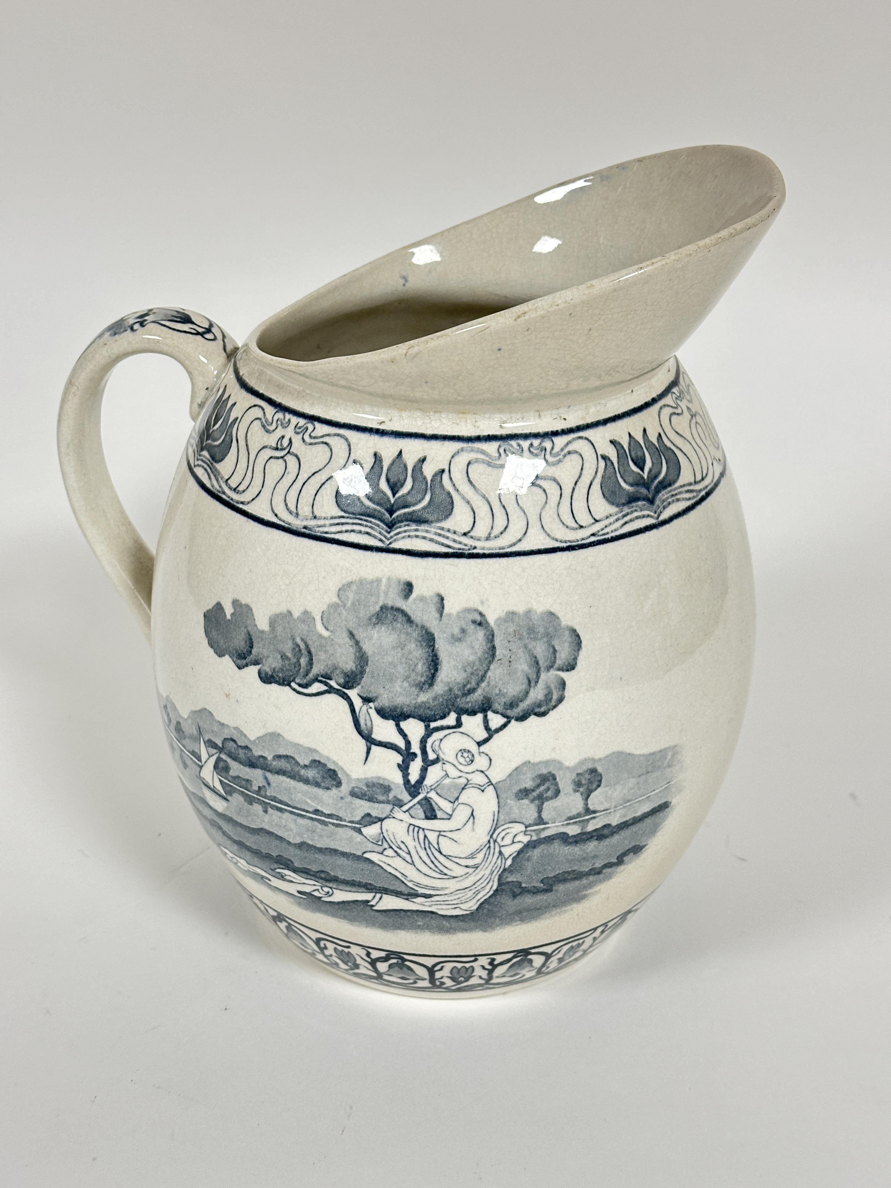A Edwardian Nautilus Porcelain Co Glasgow Possil Pottery Art Nouveau ewer with out swept rim