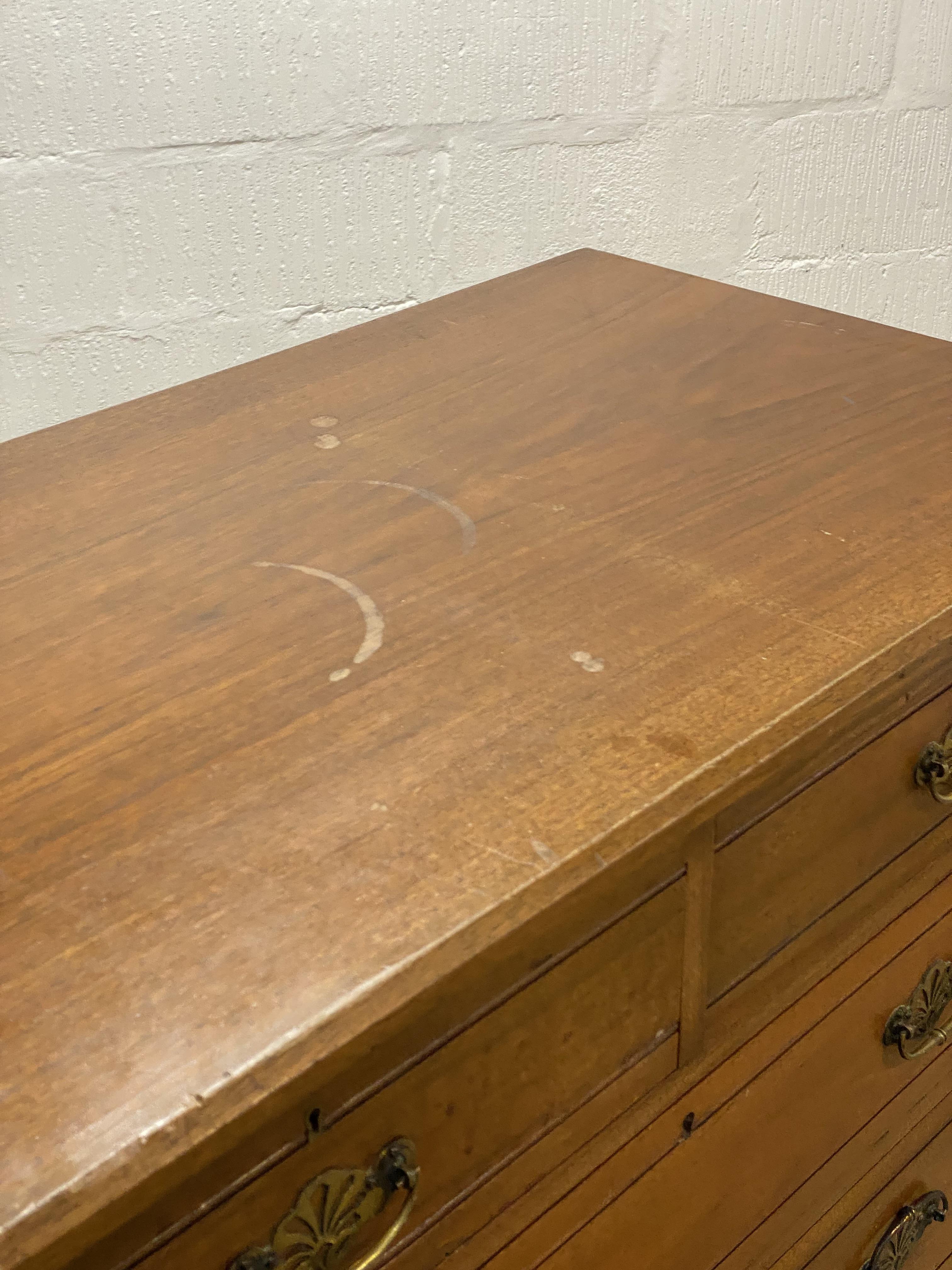 An Edwardian walnut chest of two short and three long graduated drawers, raised on a plinth base. - Image 2 of 2