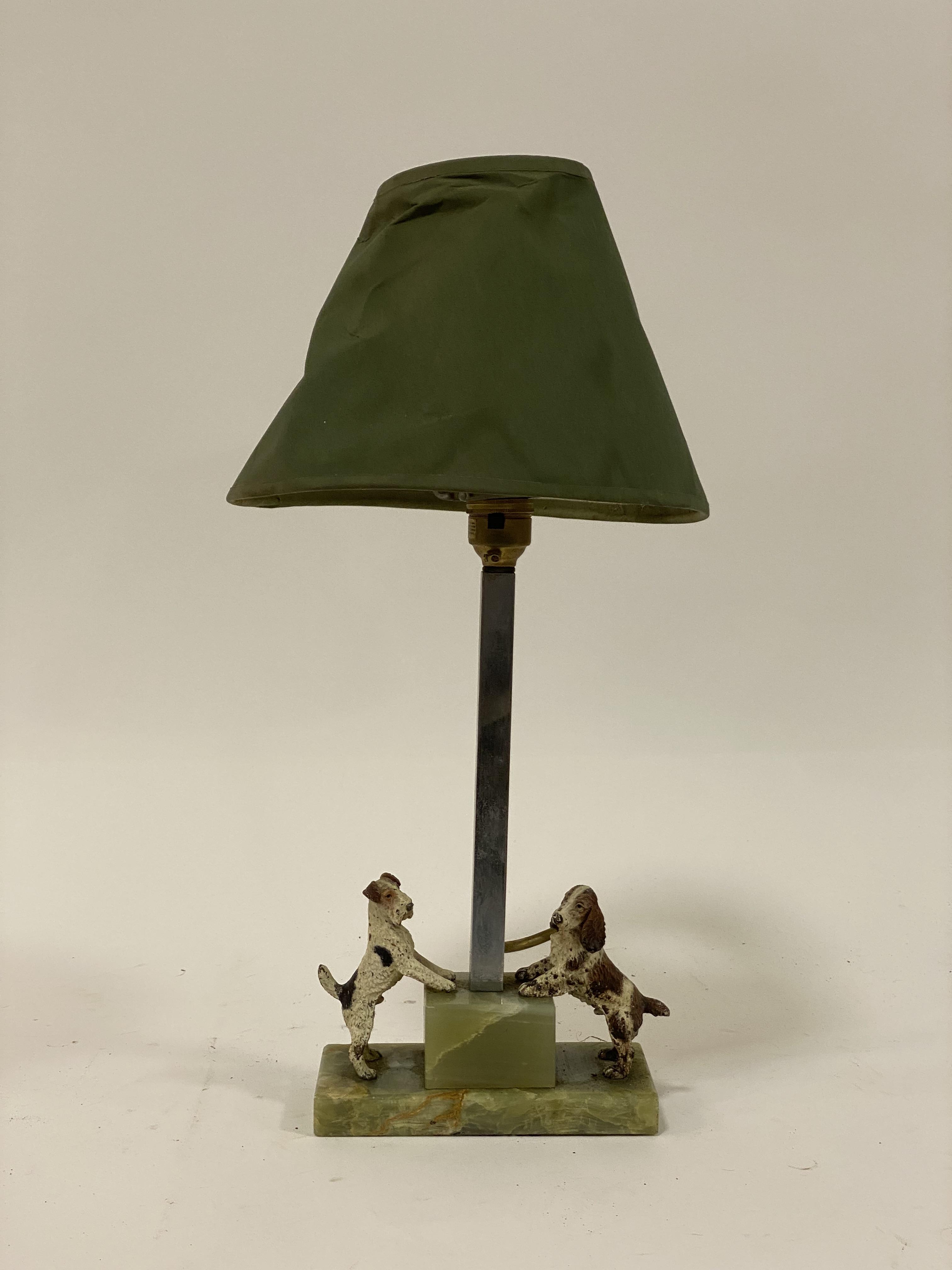 A 1930s Art Decco lamp base, with square chrome Colum on stepped onyx base mounted with a terrier