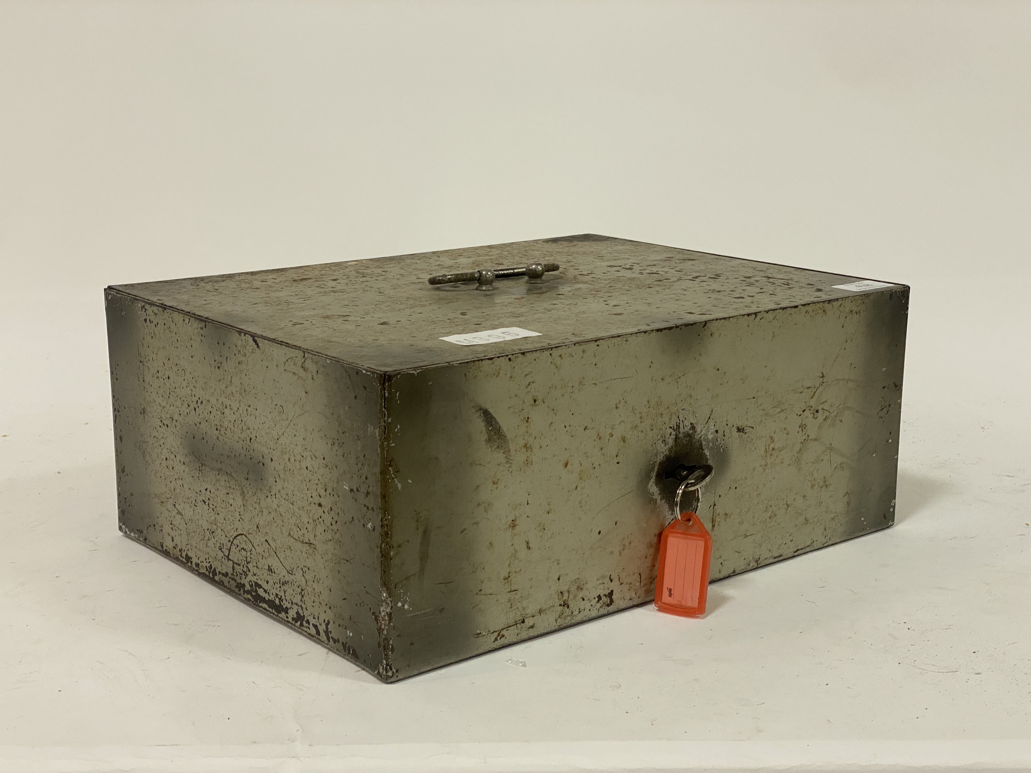 A vintage painted steel strong box with carry handle and key. W40cm.