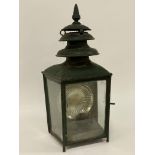 A 19th century green painted station wall lantern, bearing Pitter & Sons metal label, fiinial on